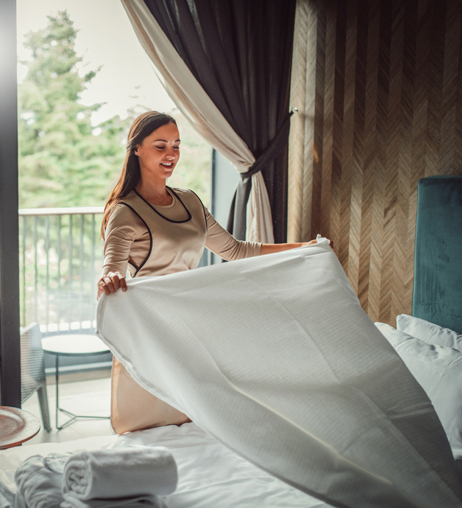 a woman sitting on a bed